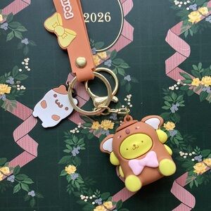 Pompompurin dressed as a koala Keychain